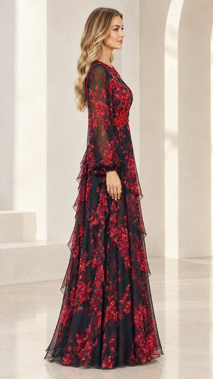 Side profile of woman wearing black and red floral tiered maxi gown