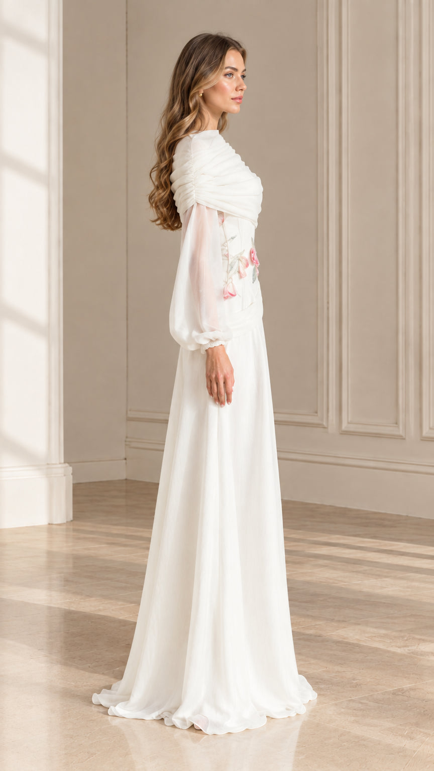 Side profile view of elegant white long sleeve formal gown