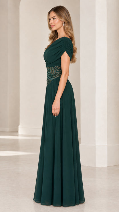 Side profile view of emerald green one-shoulder formal evening gown