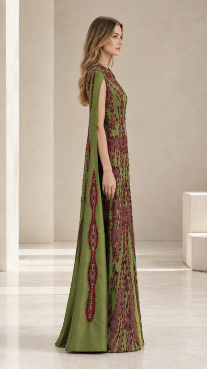 Side profile of olive green floor-length cape maxi dress