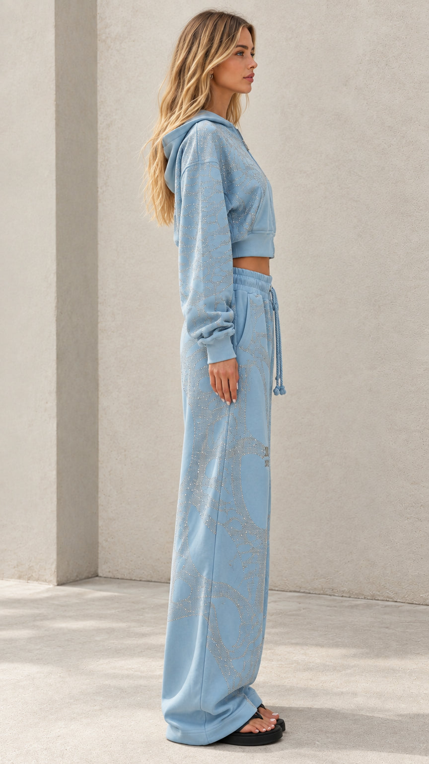 Side profile view of Light Blue rhinestone embellished tracksuit set
