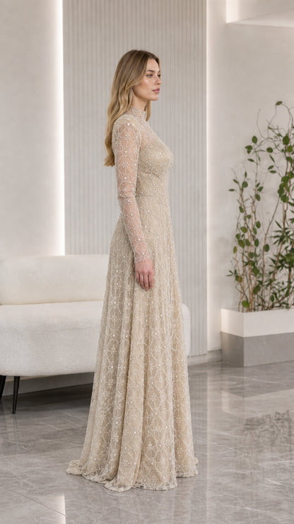 Side profile of elegant champagne beaded A-line formal maxi dress