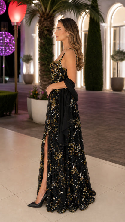 Side profile of woman in black sequin formal gown showing thigh-high slit