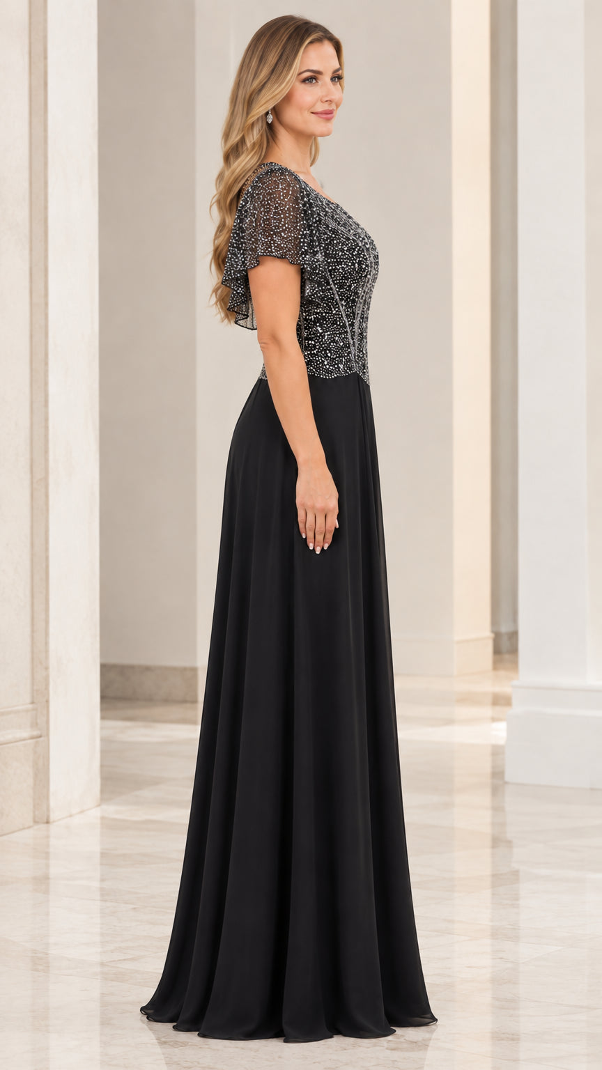 Side view of black beaded bodice formal gown with flutter sleeves