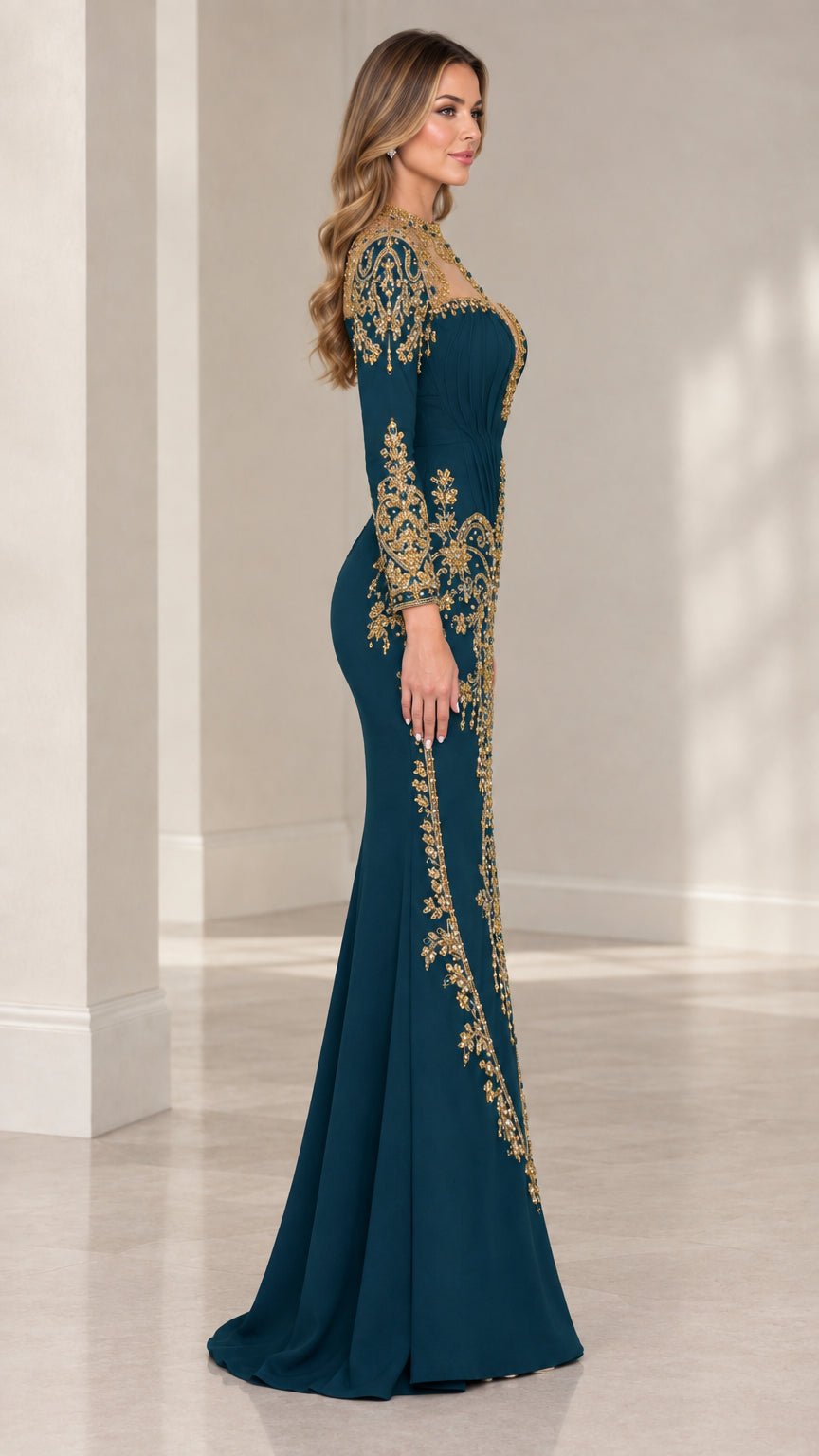 Side profile view of teal floor-length mermaid gown showing gold detailing along hips and sleeves