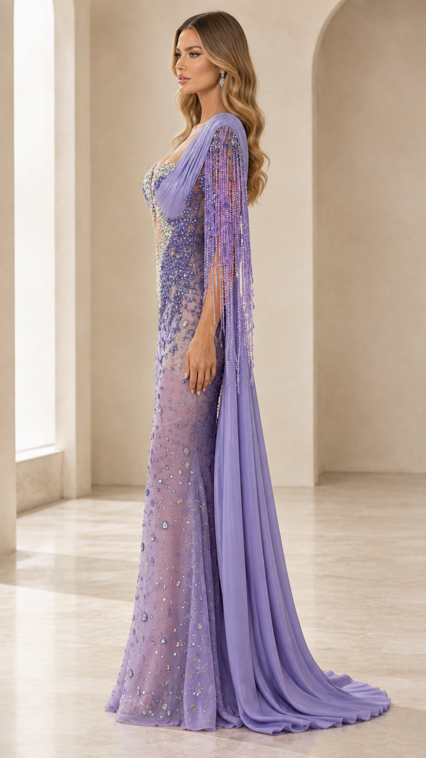 Side profile of lavender beaded formal gown showing figure-skimming fit and chiffon cape train