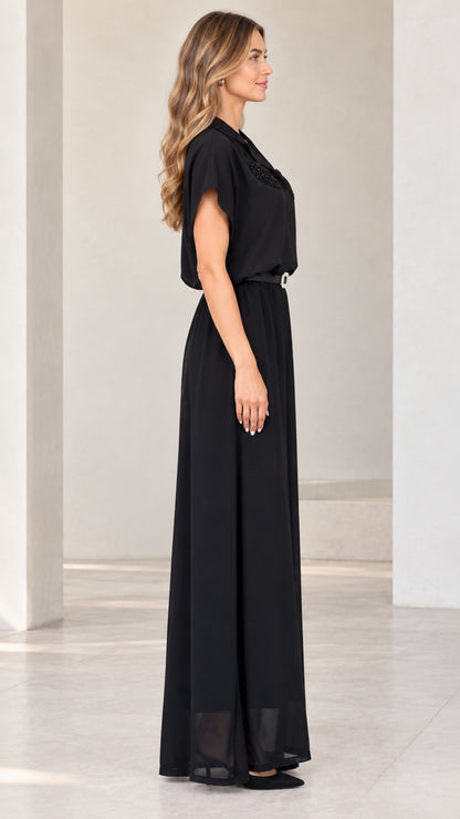 Side profile view of elegant black wide-leg jumpsuit with short sleeves
