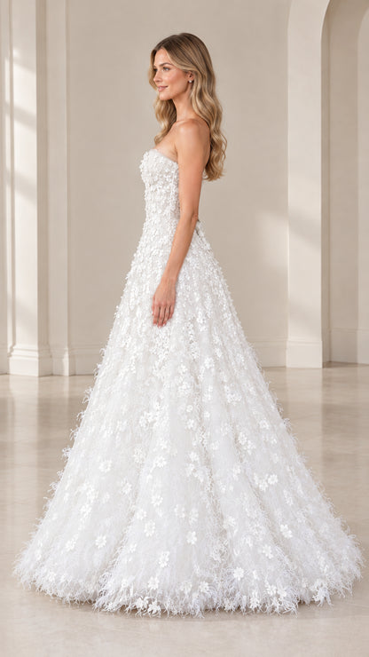 Side profile view of strapless white 3D floral evening dress