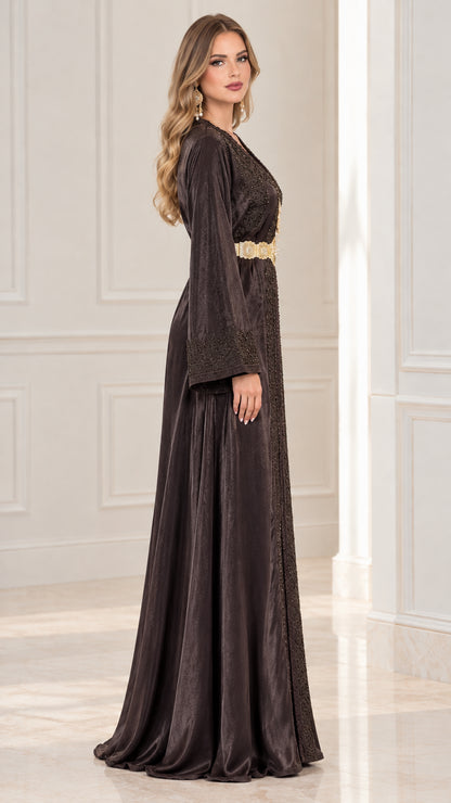 Side 3/4 angle of flowing black satin kaftan gown