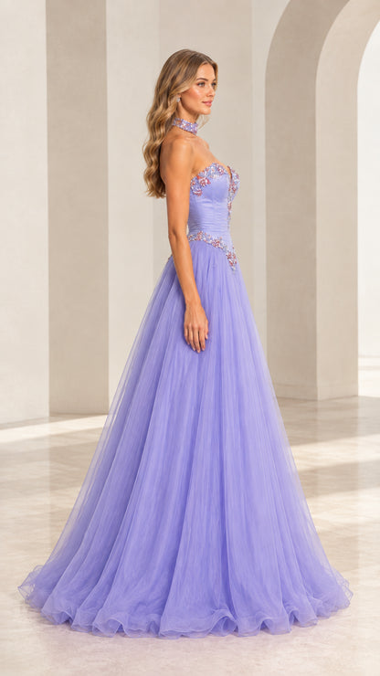 Side profile of model wearing lavender sweetheart tulle evening gown