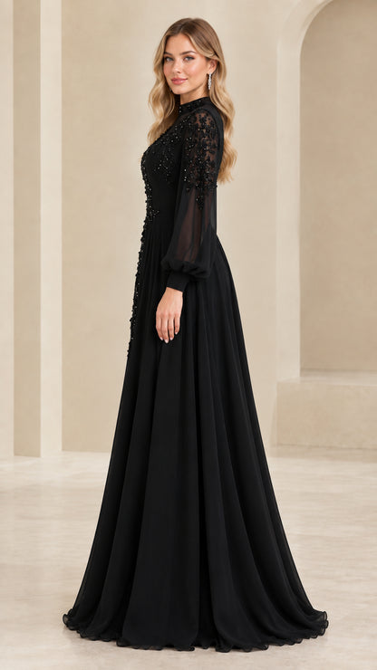 Side 3/4 view of black chiffon long sleeve formal dress with sequin details