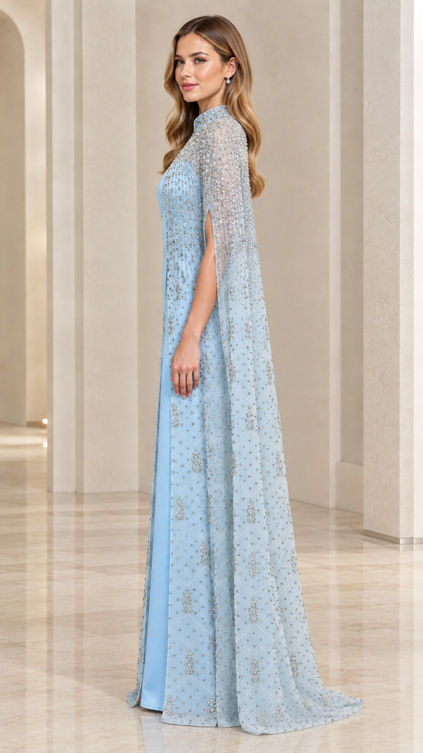 Side view of light blue floor-length gown with embellished cape