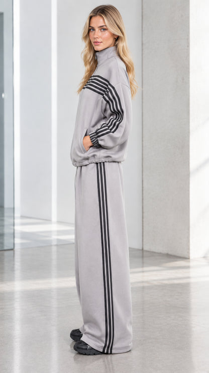 Side profile view of woman wearing Heather Grey matching tracksuit set
