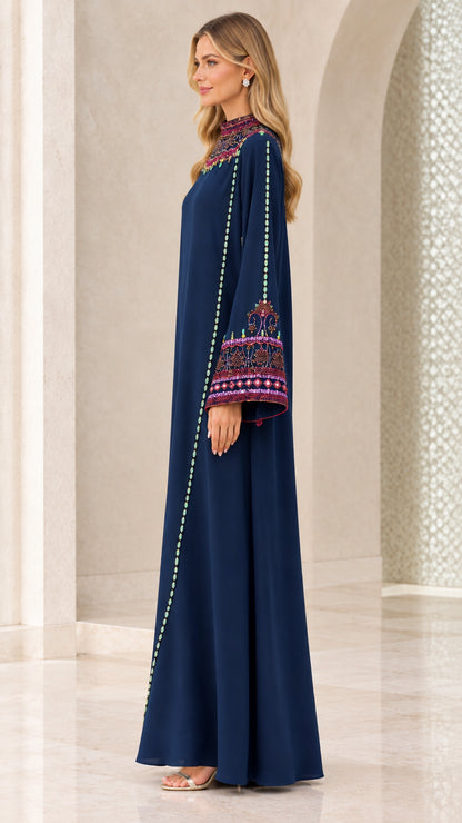 Side profile view of woman in navy blue long sleeve modest maxi dress