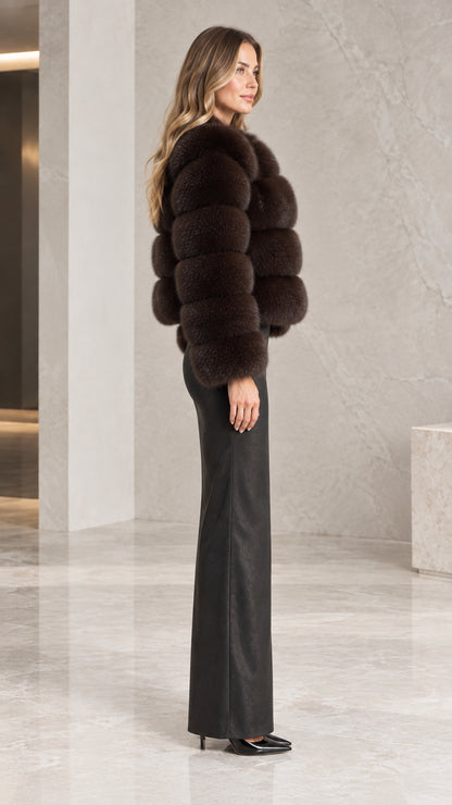 Side profile view of the espresso brown tiered faux fur jacket showing cropped silhouette