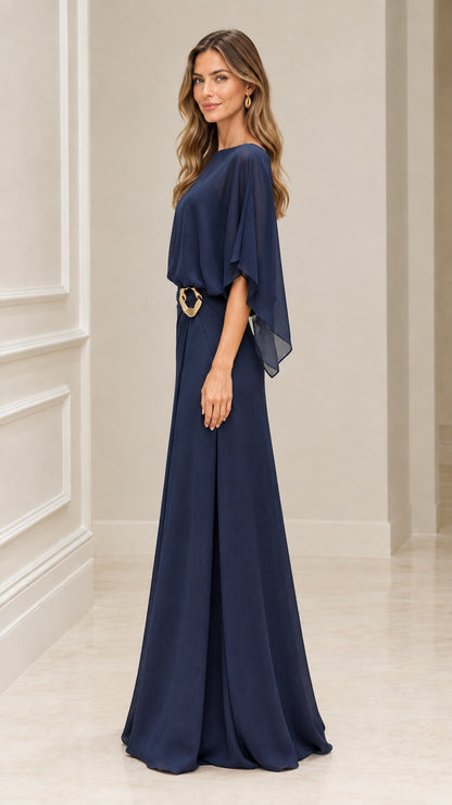 Side profile of model wearing Navy Blue draped cape evening gown