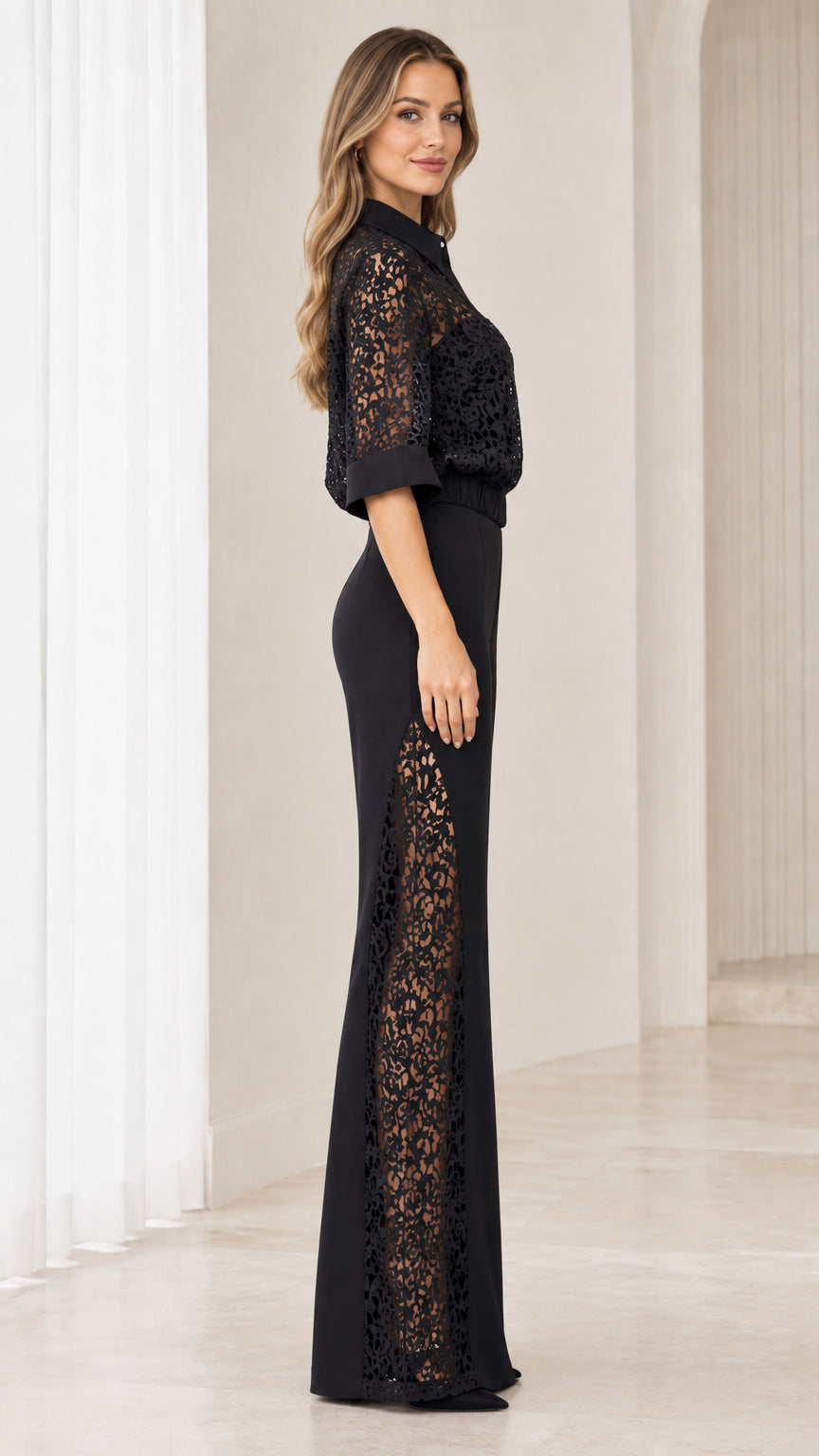 Side view of model showing lace flare leg insert on black jumpsuit