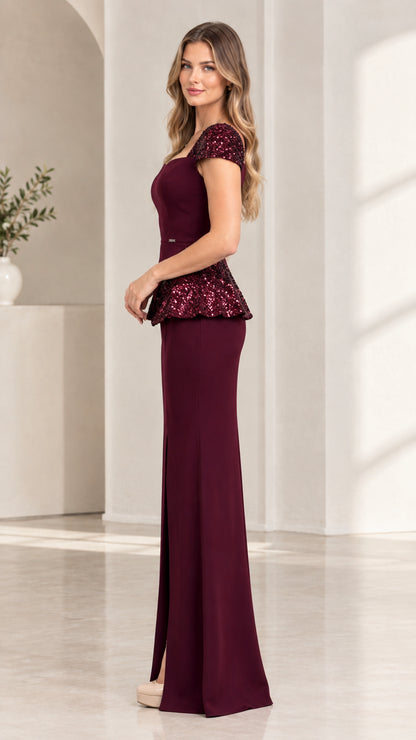 Side profile view of burgundy sequin cap sleeve floor length evening dress