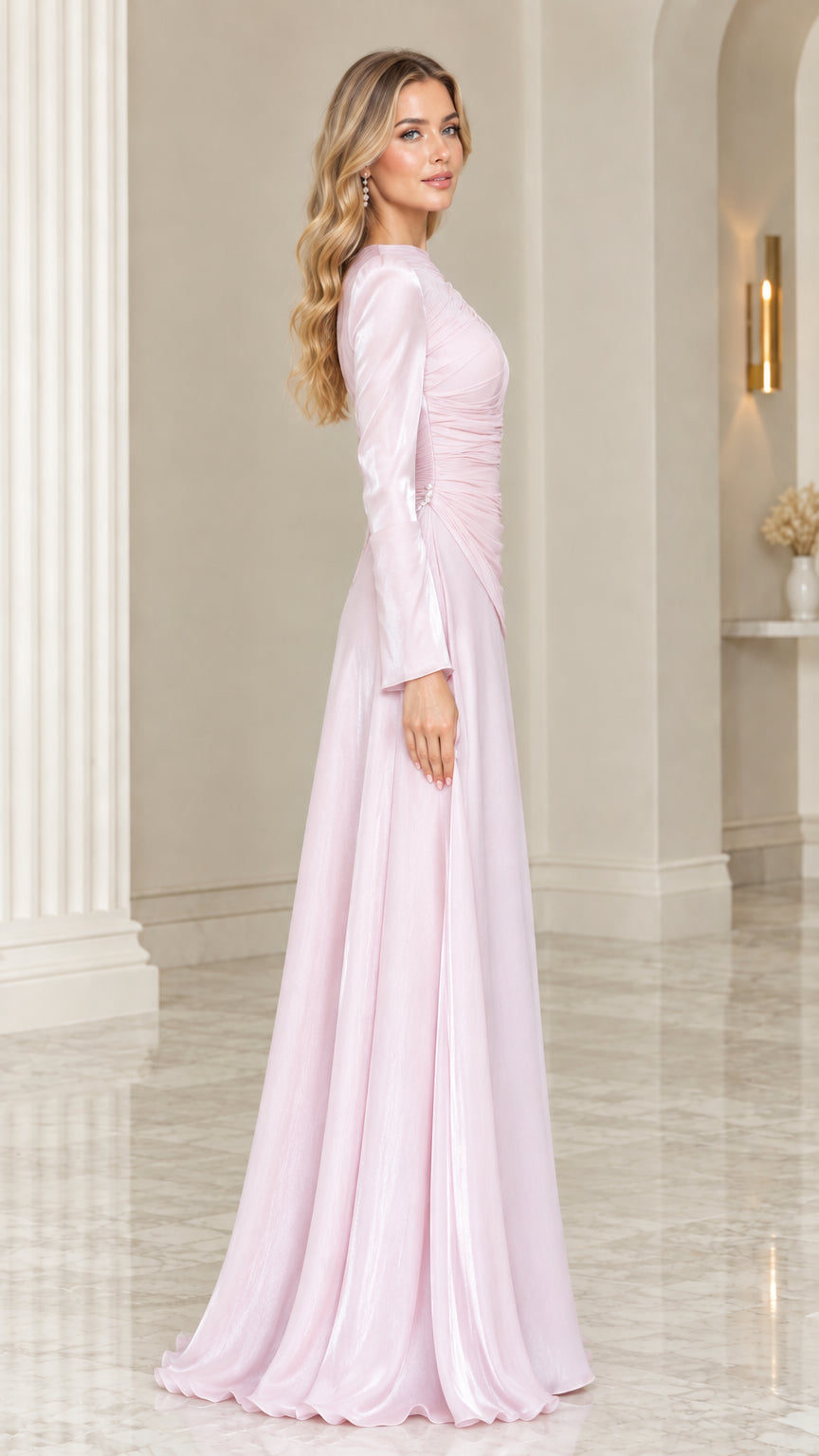Side profile view of blush pink A-line floor-length formal gown with draped waist