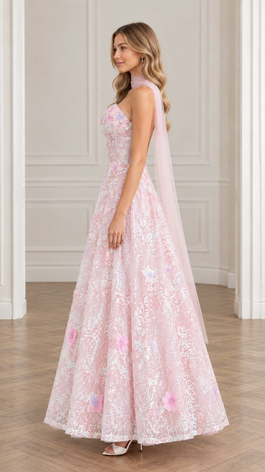 Side full-length view of model wearing Blush Pink floral appliqué tulle formal dress