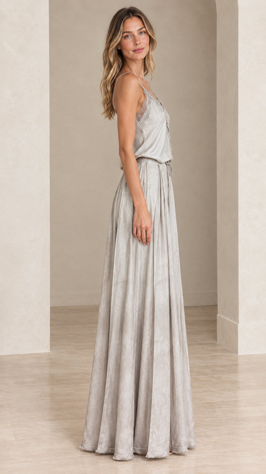 Model wearing silver grey lace-trim cami maxi dress side profile