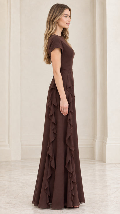 Side profile view of chocolate brown short sleeve ruffle evening gown