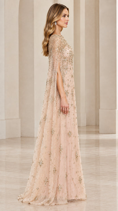 Side view of champagne formal evening dress showing split cape sleeve design