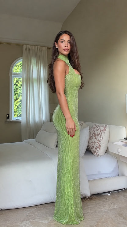 Side view of woman posing in Lime Green sparkle knit maxi gown