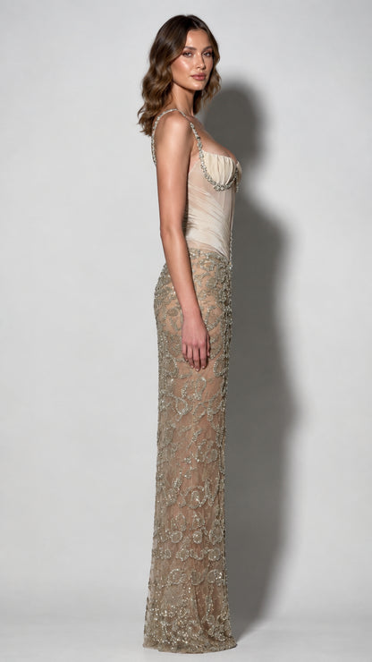 Side profile view of champagne beaded corset formal dress