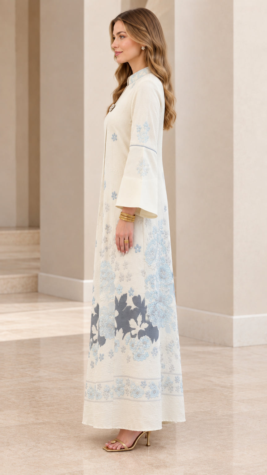 Side profile view of Cream long kaftan dress with bell sleeves and floral embroidery