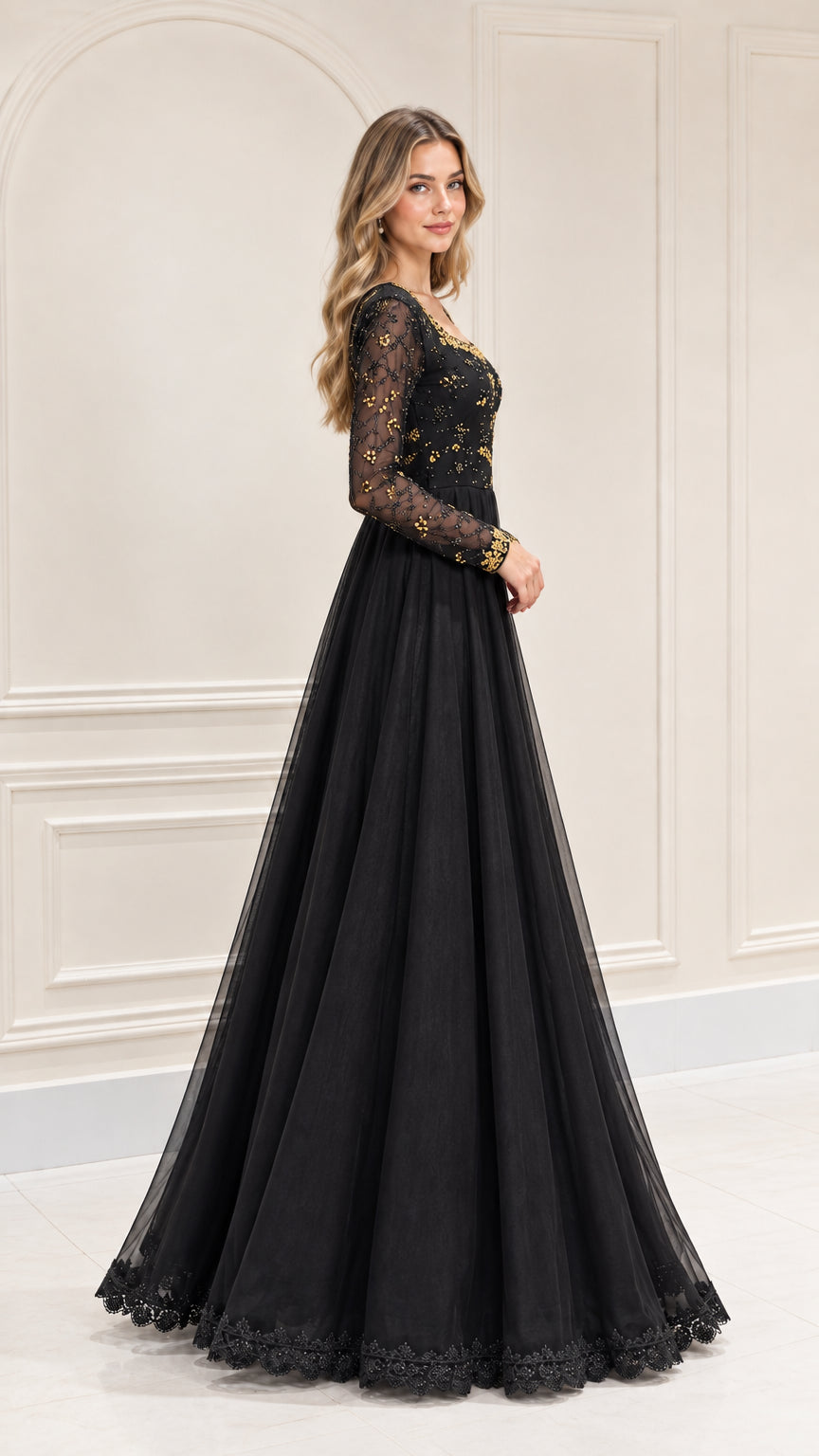 Side angle view of flowing black tulle formal maxi gown