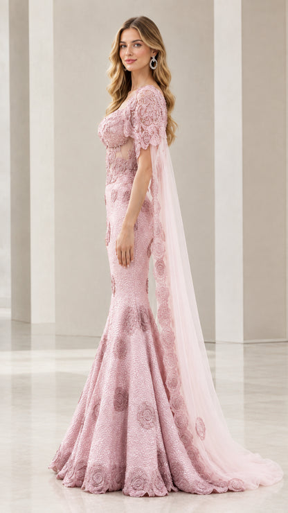 Side profile of dusty rose mermaid formal gown with flowing train and cape
