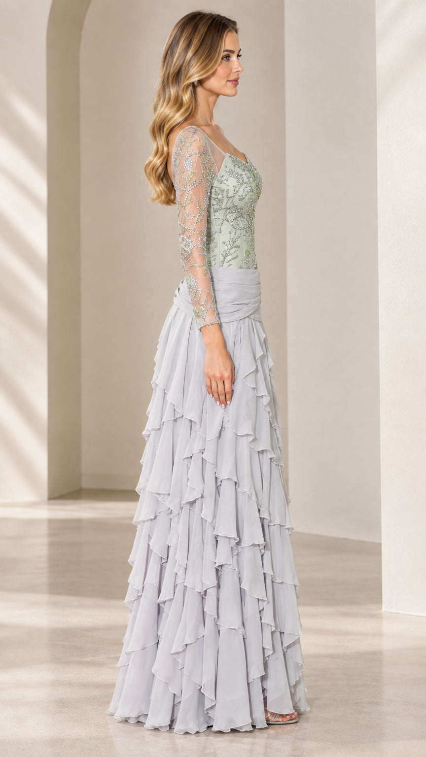 Side profile of Sage Green formal gown showing long sleeves and cascading ruffles