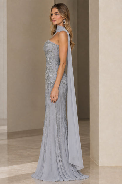 Side view of woman wearing Silver Grey embellished floor-length formal gown with scarf
