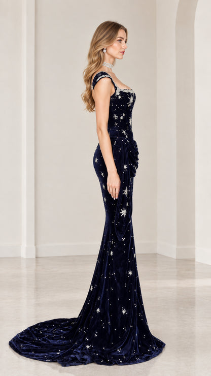 Side profile of navy blue starry velvet mermaid gown with elegant train