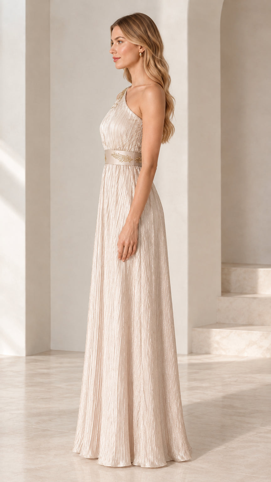 Side profile of model wearing Champagne one-shoulder pleated maxi dress