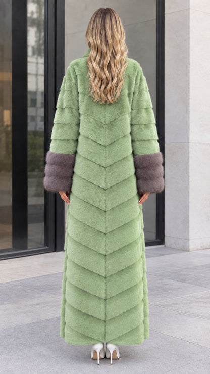 Back view of women's sage green chevron faux fur maxi coat