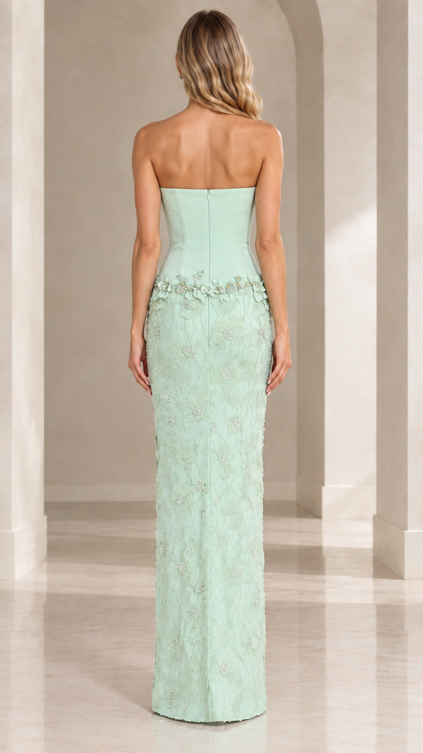 Back view of mint green formal evening gown with fitted back silhouette