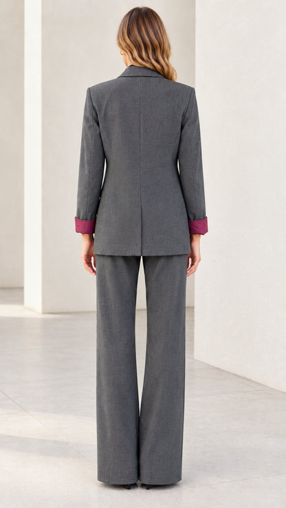 Back view of women's charcoal grey single-button blazer and matching pants