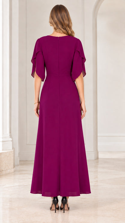Back view of model showing clean silhouette of magenta formal gown