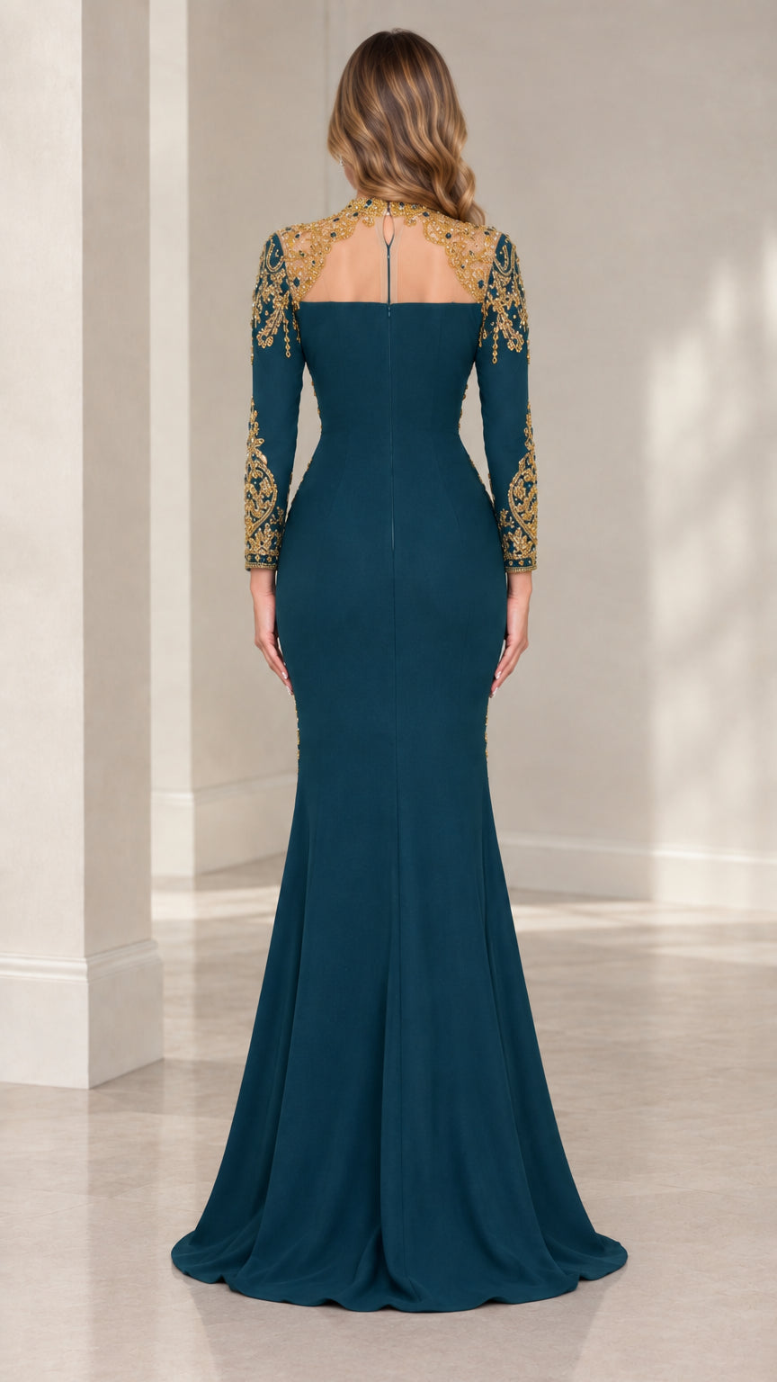 Back view of teal formal evening gown featuring sheer mesh yoke and gold crystal embellishments