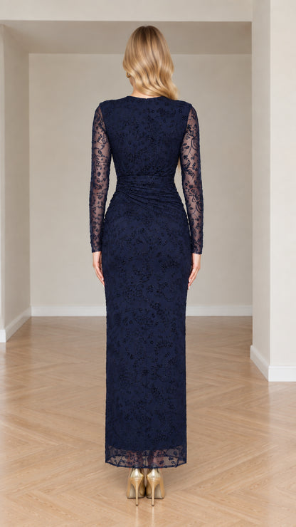 Back view of navy blue long sleeve lace evening gown with concealed zipper