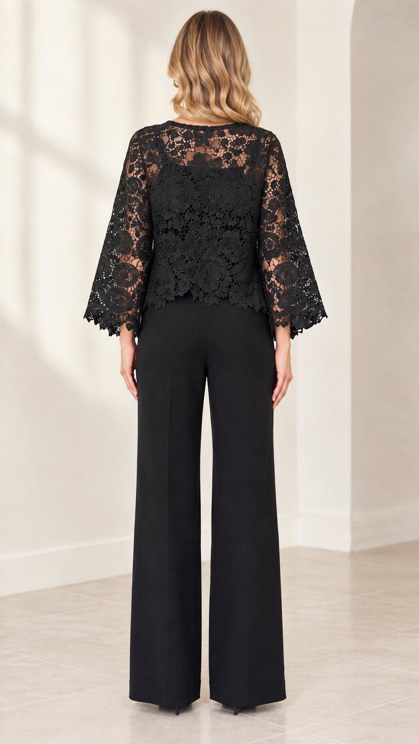 Back view of black lace overlay wide-leg jumpsuit showing sheer lace bodice