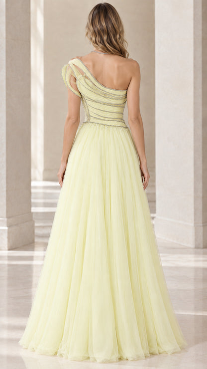 Back view of pastel yellow floor-length asymmetric tulle formal gown
