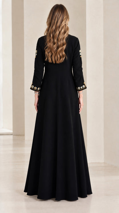 Back view of black long sleeve A-line maxi dress