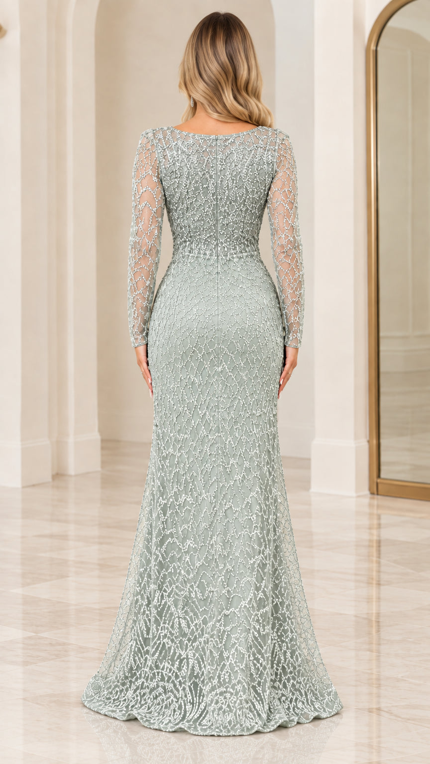 Back view of woman wearing a long sleeve sage green evening gown with beaded detailing