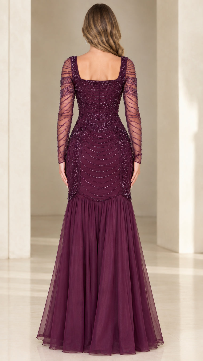 Back view of plum square back beaded evening gown with tulle skirt