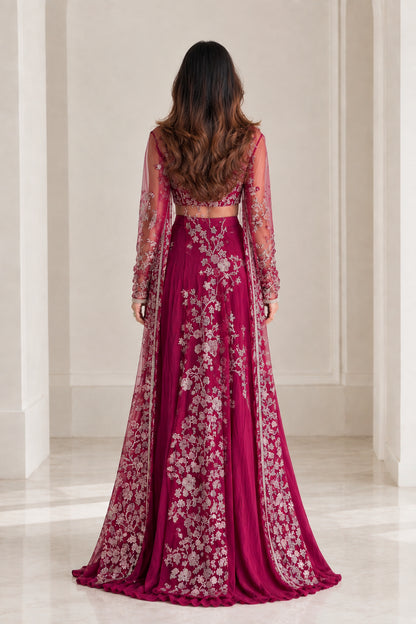 Back view of model wearing magenta embroidered duster cape and matching palazzo pants