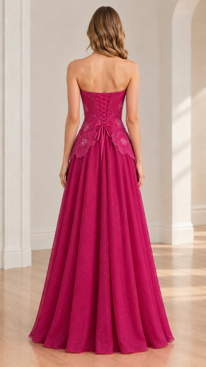 Back view of fuchsia pink gown showing lace-up corset detailing