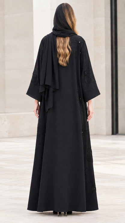 Back view of black modest maxi abaya set showing flowing drape